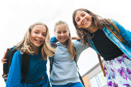 Some nice kids on the school background having fun