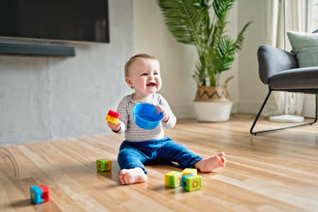 Kids play with toy on the living room