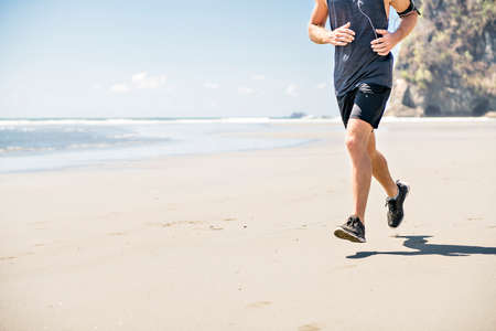 Man jogging at the beach background.の写真素材