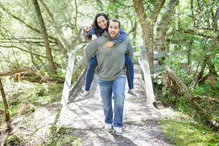 Nice couple having good time in the forestの写真素材