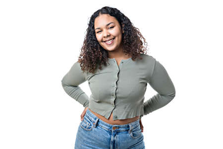 Studio portrait of beautiful brunette young dark-skinned womanの写真素材