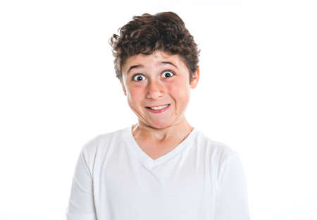 portrait of young and cute teenager isolated on whiteの写真素材