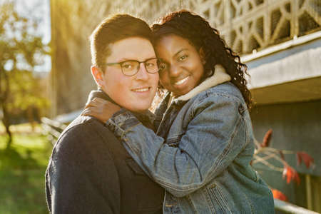 Romantic Teenage Couple In Autumn Park outsideの写真素材