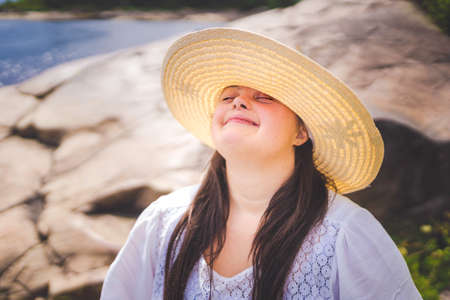 Portrait of trisomy adult outside having funの写真素材