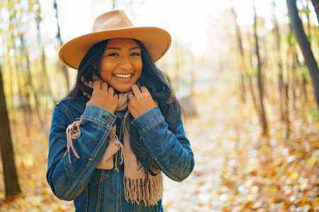 Autumn outdoor portrait of beautiful black American young womanの写真素材