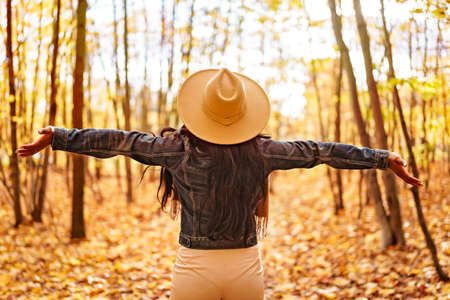 Autumn outdoor portrait of beautiful black American young womanの写真素材