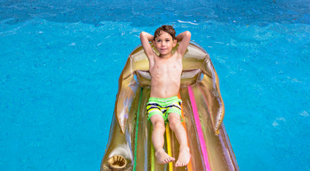 child relax in Pool on the summer timeの写真素材