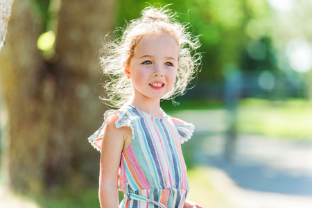 Happy kid on playground on summer season