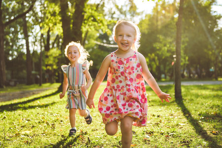 Happy kids having fun play together on summer season