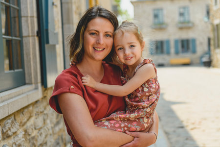 mother and daughter in summer season in quebec city
