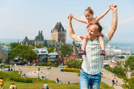father and daughter in summer season in quebec cityの写真素材