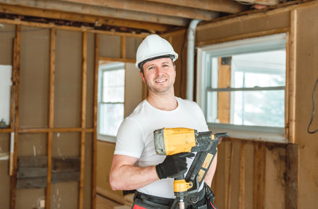 Carpenter men working in an old house