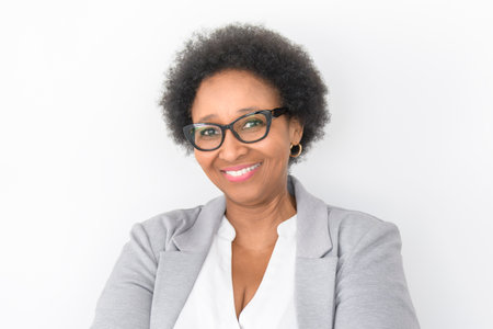 nice Portrait of an black business woman on studio white backgroundの写真素材
