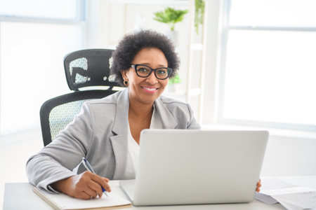 nice Portrait of an black business woman sit at the officeの写真素材