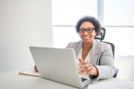 nice Portrait of an black business woman sit at the officeの写真素材