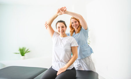 Modern rehabilitation physiotherapy at work with client