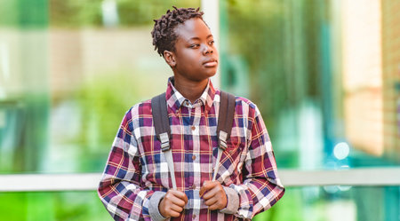 Portrait Of Male Teenage Student Outside Buildingsの写真素材