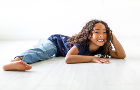 An Adorable black american little girl with beautiful hairstyleの写真素材