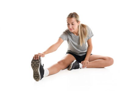 young teen athlete girl over white background