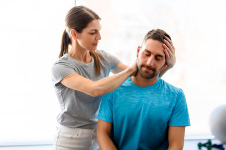 Modern rehabilitation physiotherapy woman worker with man client