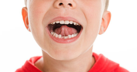 close portrait of lost tooth of a 5 years old child