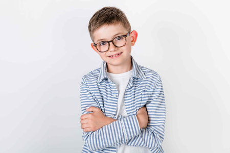Photo of adorable young happy boy looking at camera.