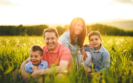 Nice family Playing on great field at Sunset