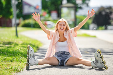 Attractive blonde relaxes while roller skating