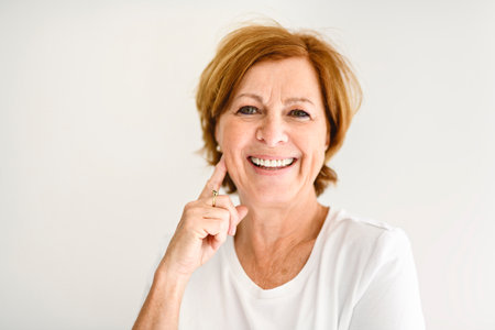Senior casual woman style portrait, studio shot, isolated on white background