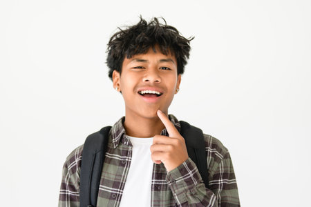 adorable thai student wearing backpack isolated on white background, Portrait children boy