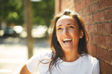 Portrait of stylish middle-aged adult lady in urbanの写真素材