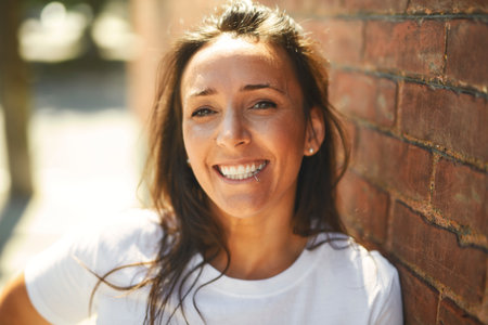 Portrait of stylish middle-aged adult lady in urban