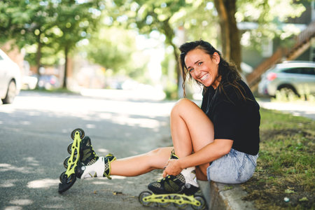 woman inline skates in an urban park, doing exciting skating session