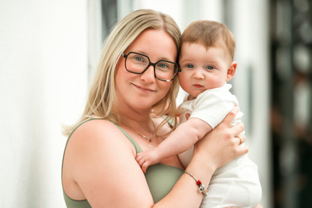 Happy family. little girl child baby daughter with mother