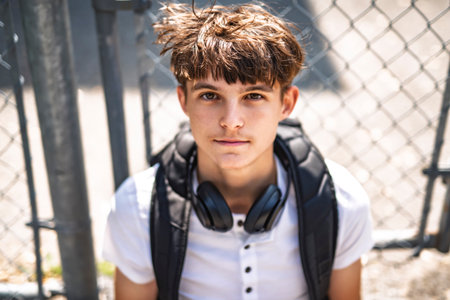 Portrait of smiling boy with his backpackの写真素材
