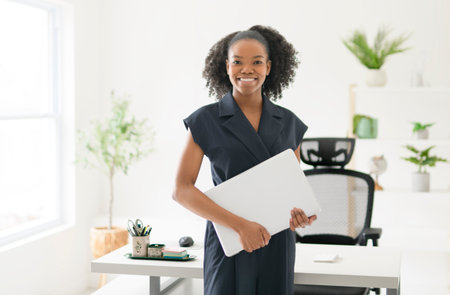analyst woman using laptop computer in office.の写真素材