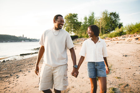 Cheerful father and her daughter on beautiful seascape