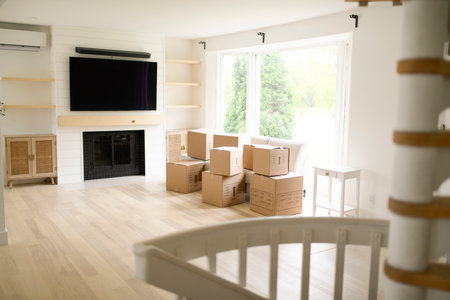Interior with moving boxes in white roomの写真素材