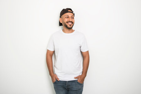 young islamic arab man against white studio wallの写真素材