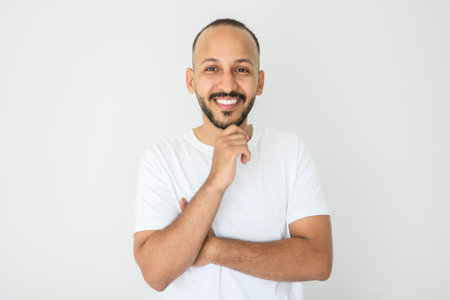 young islamic arab man against white studio wallの写真素材