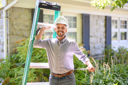 man with hard hat house inspector