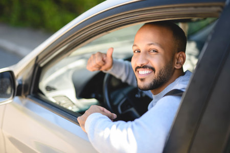 young man with his new carの写真素材