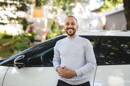 young arab man with his new carの写真素材