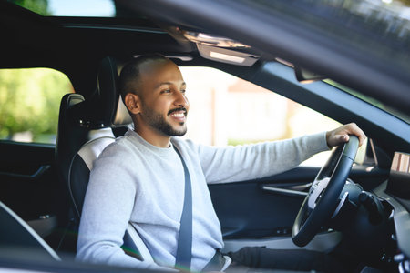 young arab man with his new car