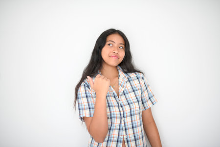 thailand teen girl on studio shot isolated white background,の写真素材