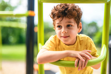 Happy kid on playground on summer season