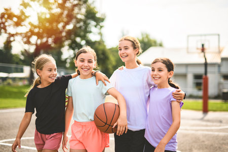 Childs girls Team in sportswear playing basketball gameの写真素材