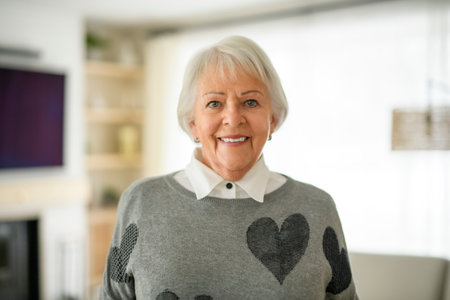Portrait of elderly woman on living room at home