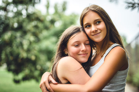 Girlfriends having fun outdoors togetherの写真素材
