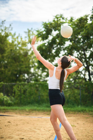 teen play volleyball in summer seasonの写真素材